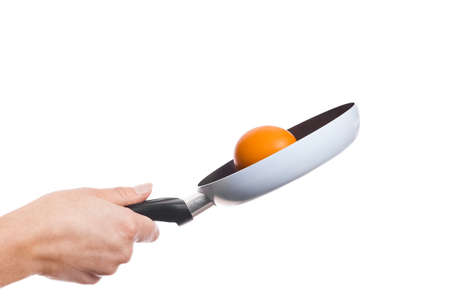 pan in hands on a white backgroundの写真素材