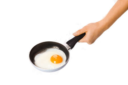 pan in hands on a white backgroundの写真素材