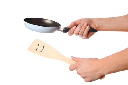 pan in hands on a white backgroundの写真素材