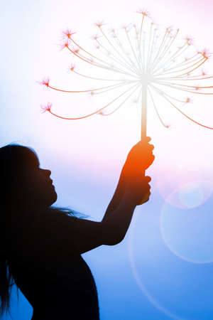 beautiful child playing outdoors in the parkの写真素材