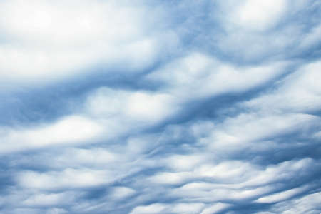 Clouds fluffy in the sky storm on nature background. Danger before the rain.