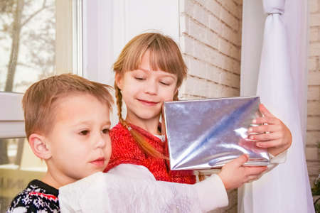 happy kids at home at christmasの写真素材