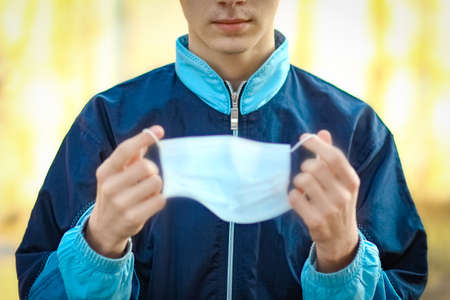 masked man from coronavirus and air. Protection against PM 2.5 air polluted from the virus in Europe and Asiaの写真素材