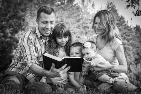 happy family outdoors in the parkの写真素材