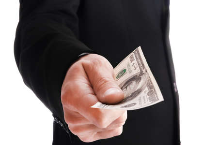 Business man holding money on white backgroundの写真素材