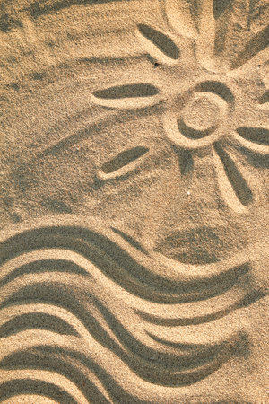 background of sand by the sea with son on summerの写真素材