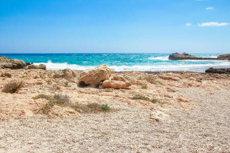 beautiful beach with waves in the nature of the backgroundの写真素材