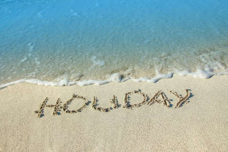 beautiful drawings on the sand of the sea shoreの写真素材