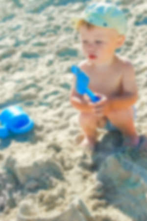 happy child playing by the sea outdoorsの写真素材