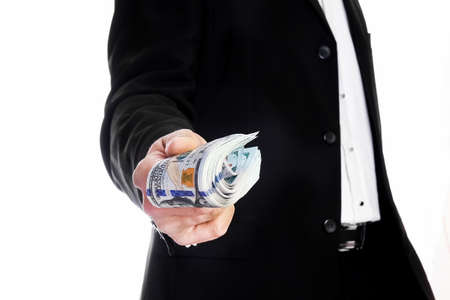 Business man holding money on white background