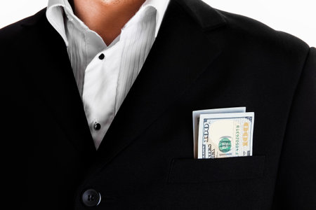 Business man holding money on white backgroundの写真素材