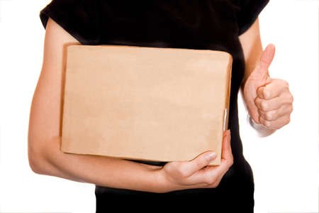 Beautiful gift in the hands of a girl on a white background