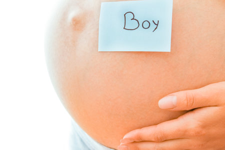 Pregnant girl on white background with stickersの写真素材