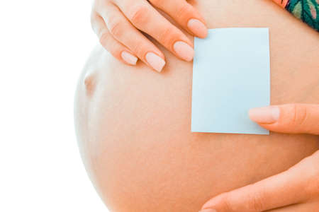 Pregnant girl on white background with stickersの写真素材