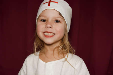 happy girl on the background of the doctorの写真素材