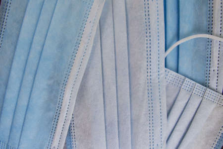 background of many  blue medical masks