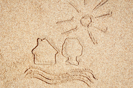 Stylishly beautiful drawings on sand background in natureの写真素材