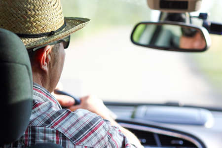driver driving a car on the roadの写真素材