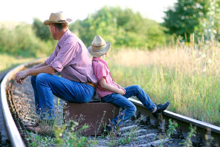 father and son cowboys concept happiness togetherの写真素材