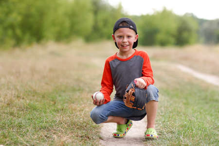 happy boy playing baseball concept sport health