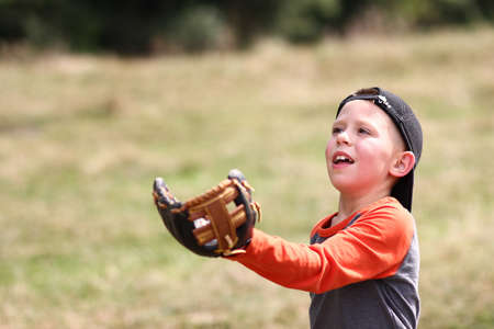 happy boy playing baseball concept sport health