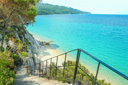 beautiful steps by the sea on nature in the park backgroundの写真素材