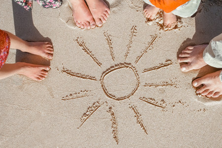 Beautiful traces with feet on sea nature backgroundの写真素材