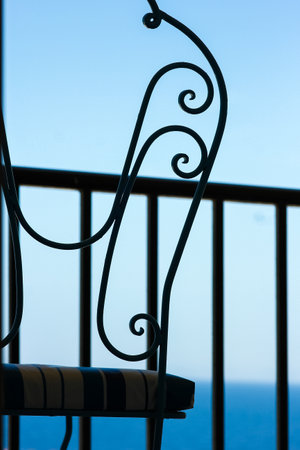 Stylish beautiful silhouette of chairs on the background of natureの写真素材