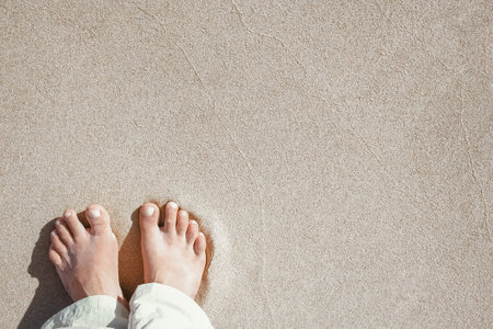 Beautiful traces with feet on sea nature background