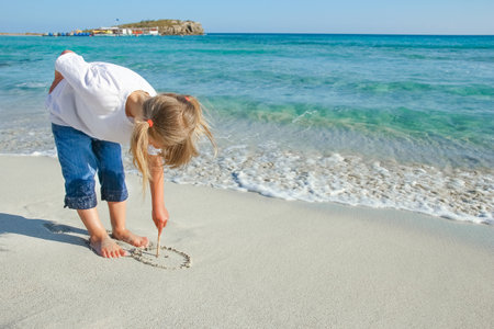 happy child by the sea in the open airの写真素材