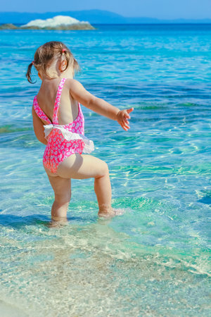 happy child playing by the seaの写真素材