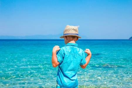 happy child by the sea in nature weekend travelの写真素材