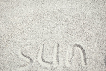 drawing on the sand by the sea travel background