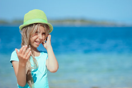 Happy child by the sea in nature travel trip vacationの写真素材