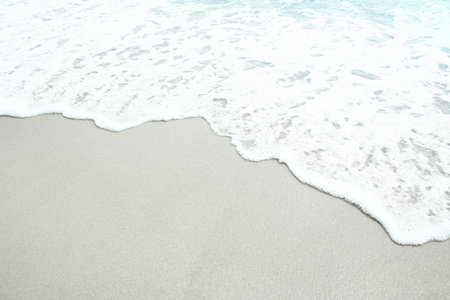 Beautiful sea and sand on the shore vacation travel backgroundの写真素材