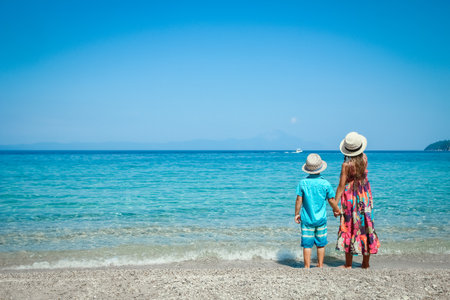 happy kids weekend by the sea in nature travelの写真素材