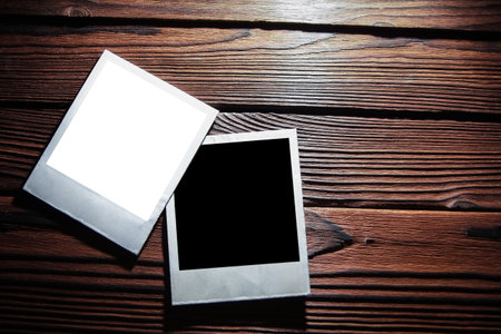 Photo album nostalgia photography on a wooden backgroundの写真素材