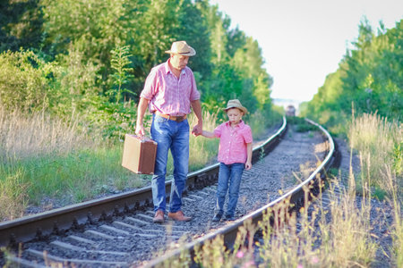 father and son cowboys concept happiness togetherの写真素材