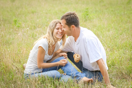 happy couple in love outdoors in the summer parkの写真素材