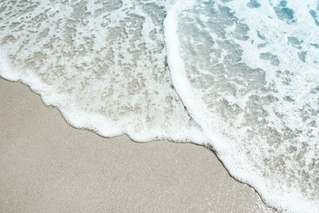 Beautiful sea and sand on the shore vacation travel backgroundの写真素材