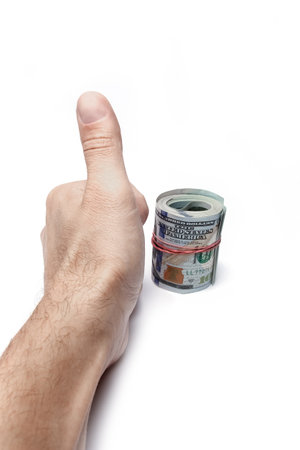 Money dollars in the hands on a white backgroundの写真素材