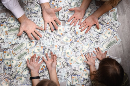 Dollars in the hands of a businessman man guy for a trip to the rest of the shopsの写真素材