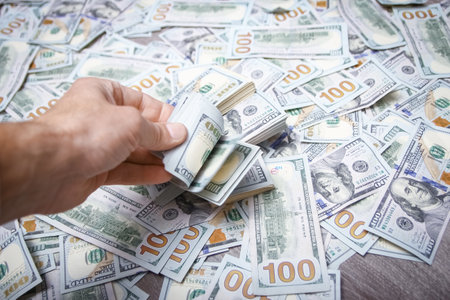 Dollars in the hands of a businessman man guy for a trip to the rest of the shops