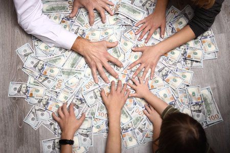 Dollars in the hands of a businessman man guy for a trip to the rest of the shops