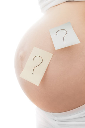 Pregnant girl on white background with stickersの写真素材