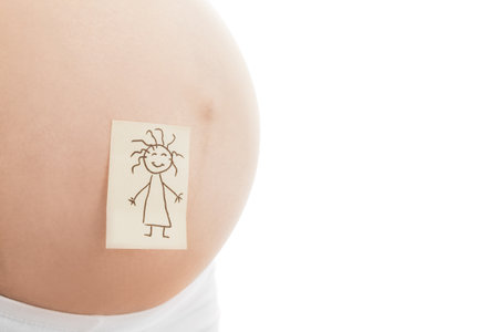 Pregnant girl on white background with stickersの写真素材