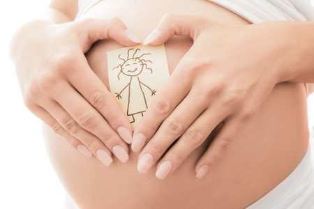 Pregnant girl on white background with stickersの写真素材