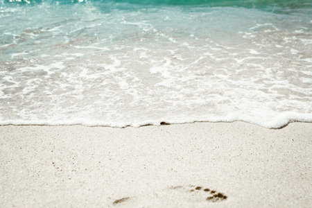 Beautiful sea and sand on the shore vacation travel backgroundの写真素材