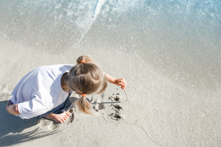 happy child by the sea in the open airの写真素材