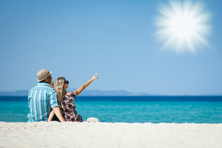Happy couple on vacation at the sea at the weekendの写真素材